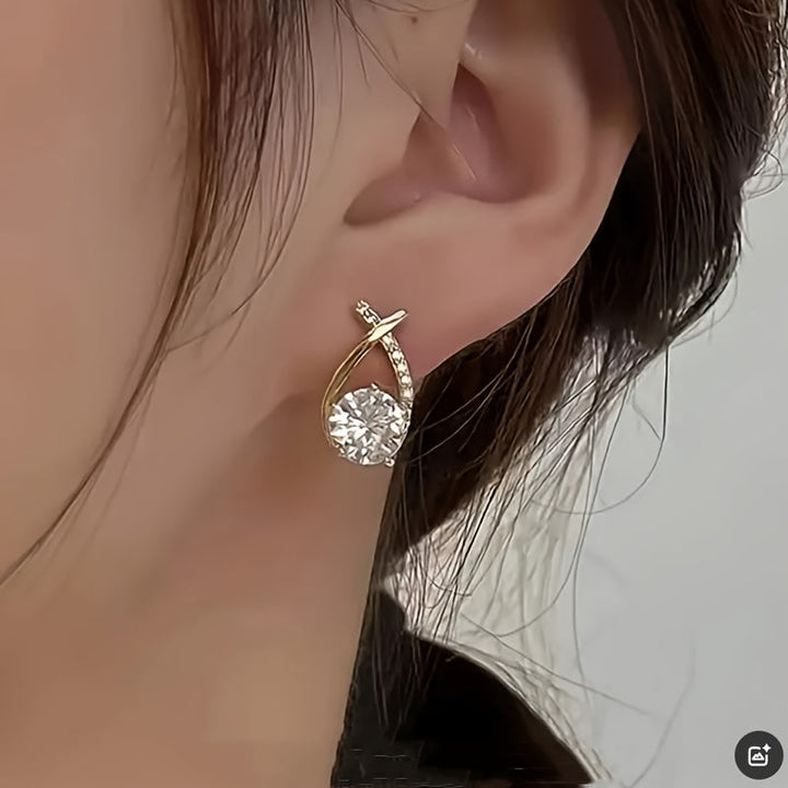 Orecchini a croce in zirconio color oro