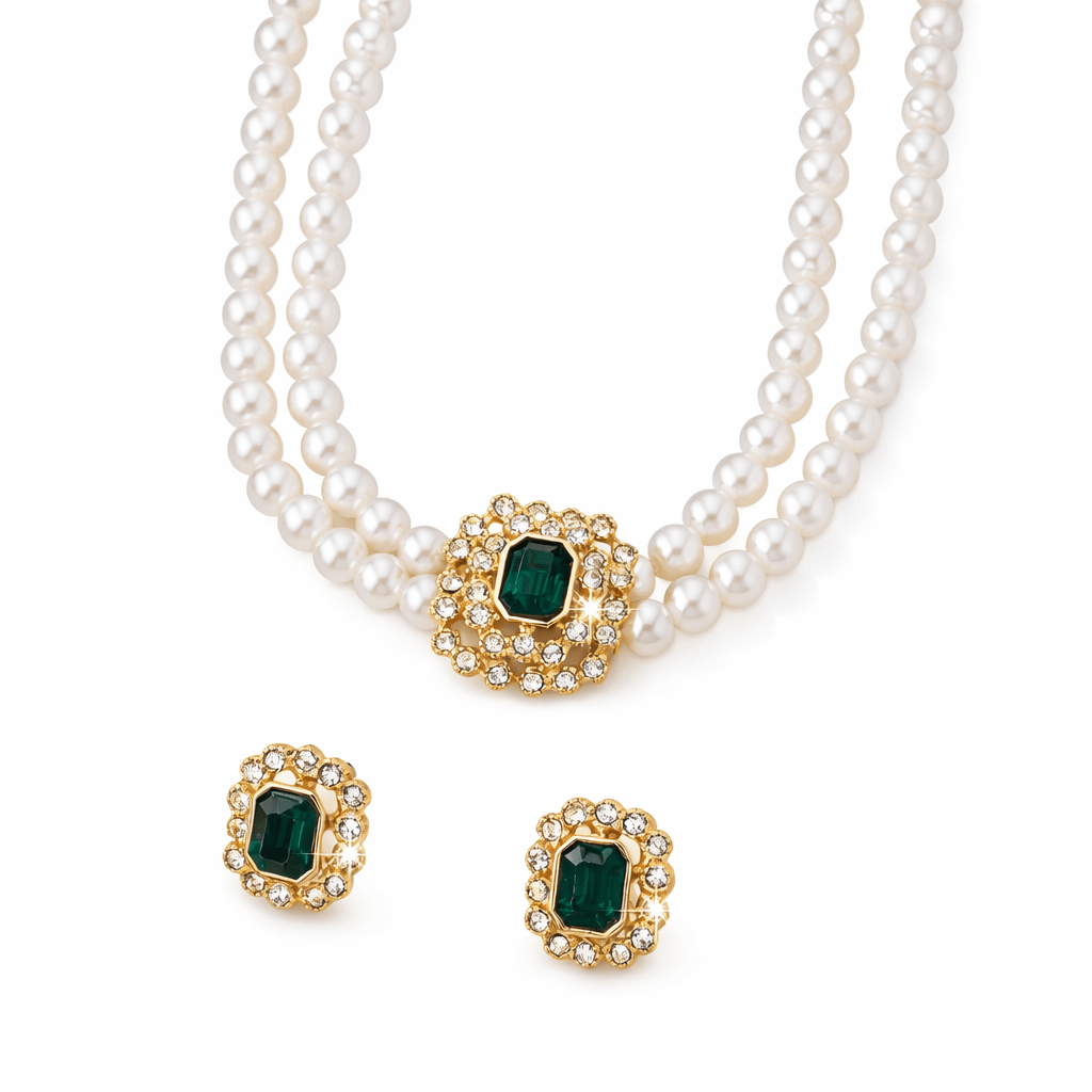 "COLLANA ELVIRA in perle e smeraldi" can be rewritten as "COLLANA ELVIRA: Perle e Smeraldi".