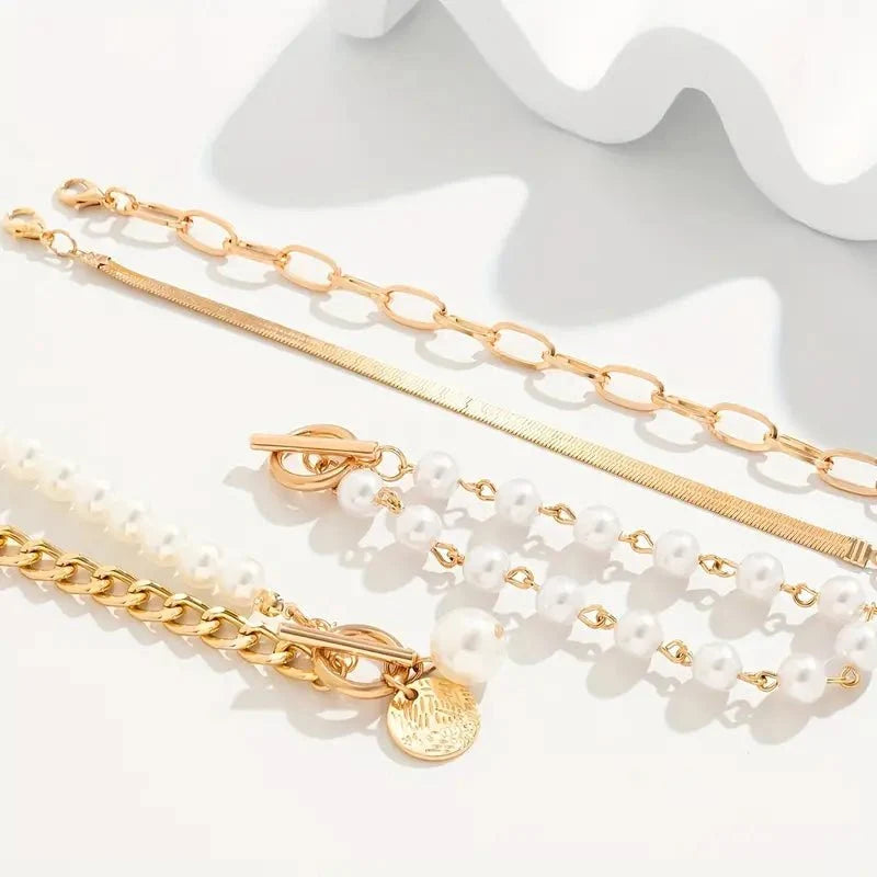 Set di 4 Bracciali Eleganti in Oro - Design a Serpente con Perle e Maglie