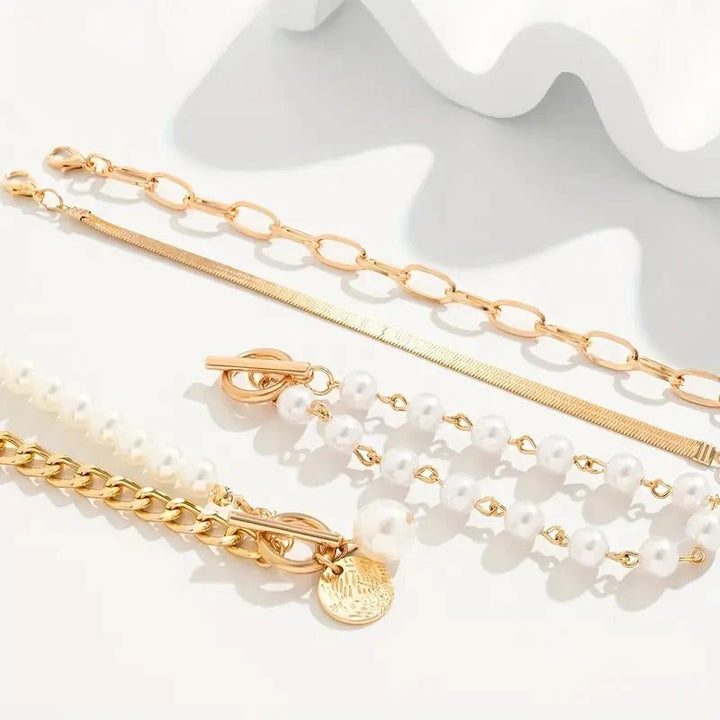 Set di 4 Bracciali Eleganti in Oro - Design a Serpente con Perle e Maglie