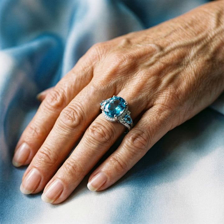Anello vintage placcato in argento con cristallo blu