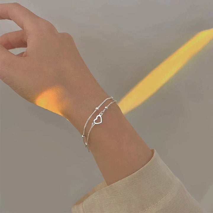 Braccialetto in argento regolabile con ciondolo a forma di cuore