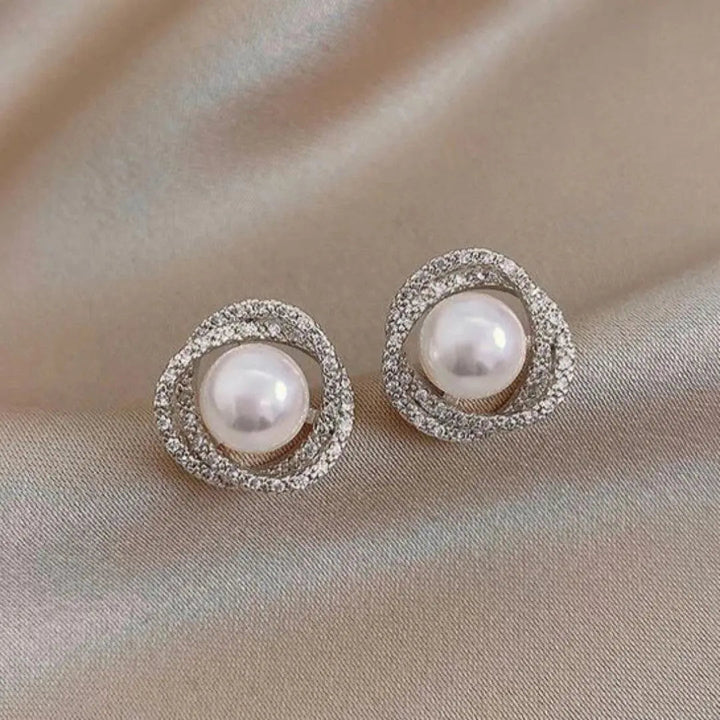 Eleganti orecchini a spirale scintillante con perle