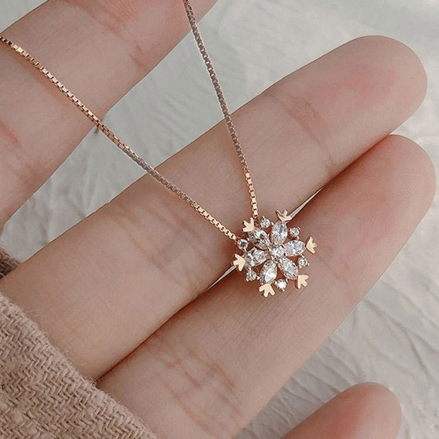 Collana in cristallo con fiocco di neve oro e argento scintillante