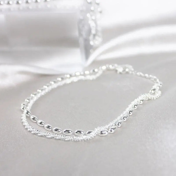 Set braccialetti in argento con zircone