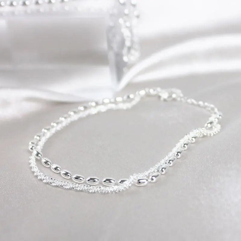Set braccialetti in argento con zircone