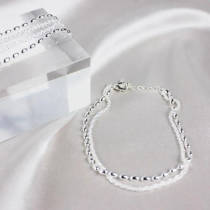 Set braccialetti in argento con zircone