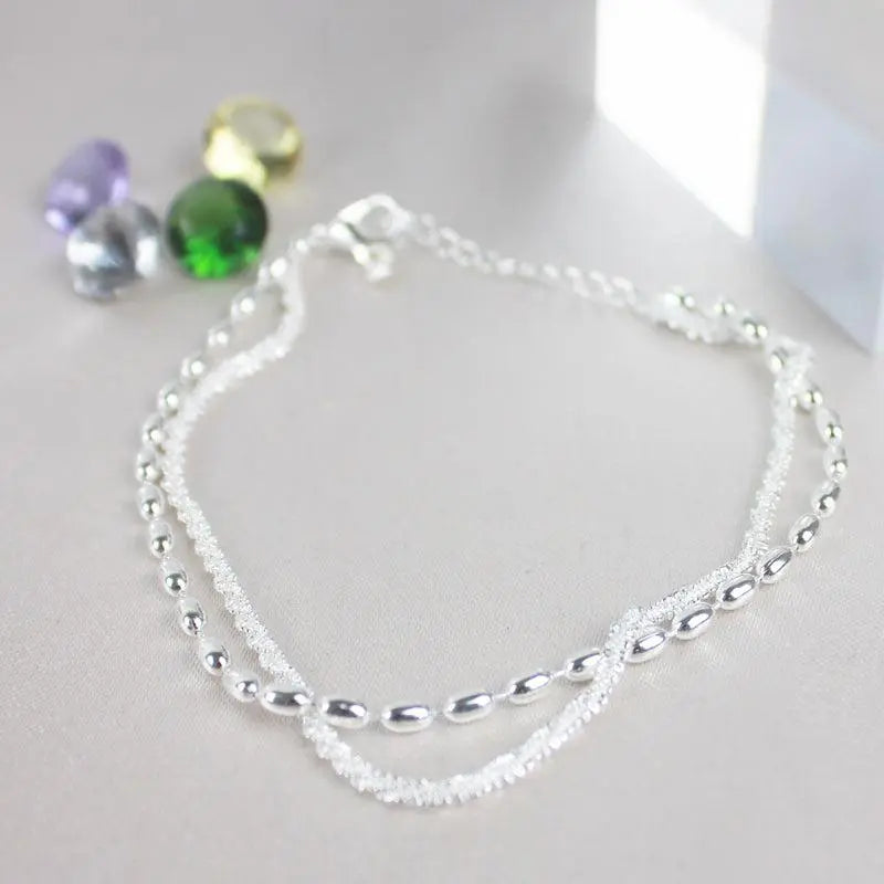 Set braccialetti in argento con zircone