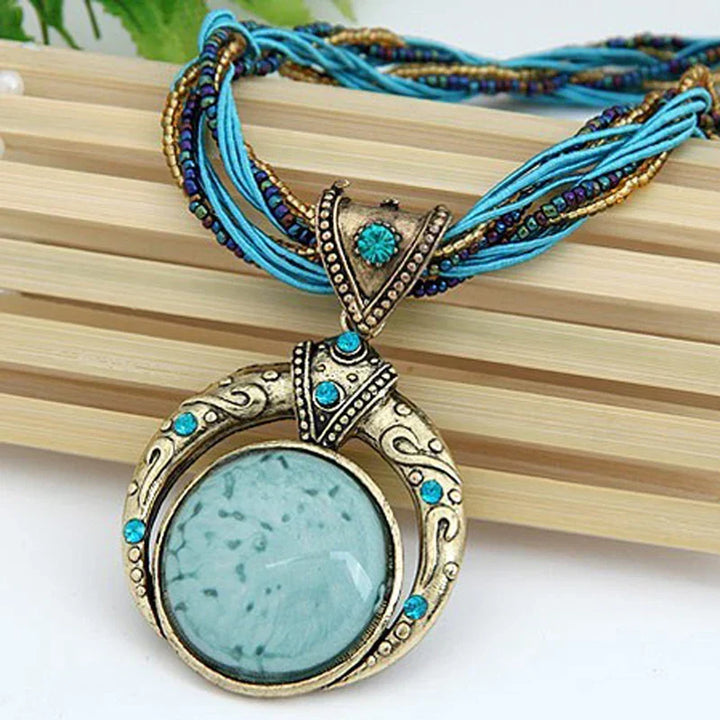 Collana vintage con ciondolo in cristallo smeraldo etnico