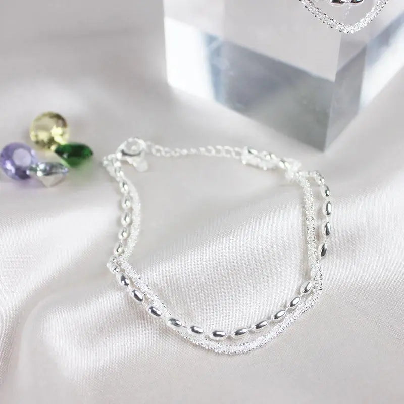 Set braccialetti in argento con zircone
