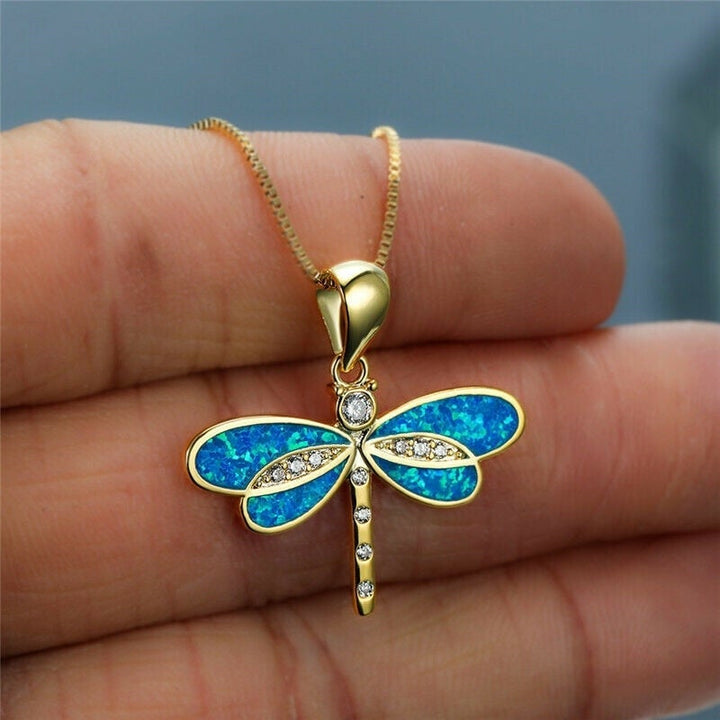 Collana in oro con opale e motivo a libellula