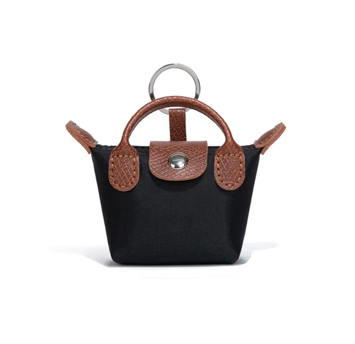 Borsa Longchamp Mini 3 in 1: portachiavi, custodia per AirPods e ciondolo a forma di labbra