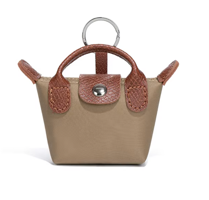 Borsa Longchamp Mini 3 in 1: portachiavi, custodia per AirPods e ciondolo a forma di labbra