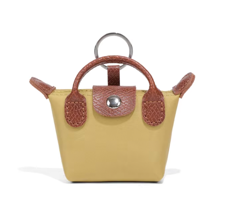 Borsa Longchamp Mini 3 in 1: portachiavi, custodia per AirPods e ciondolo a forma di labbra