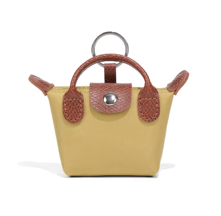Borsa Longchamp Mini 3 in 1: portachiavi, custodia per AirPods e ciondolo a forma di labbra