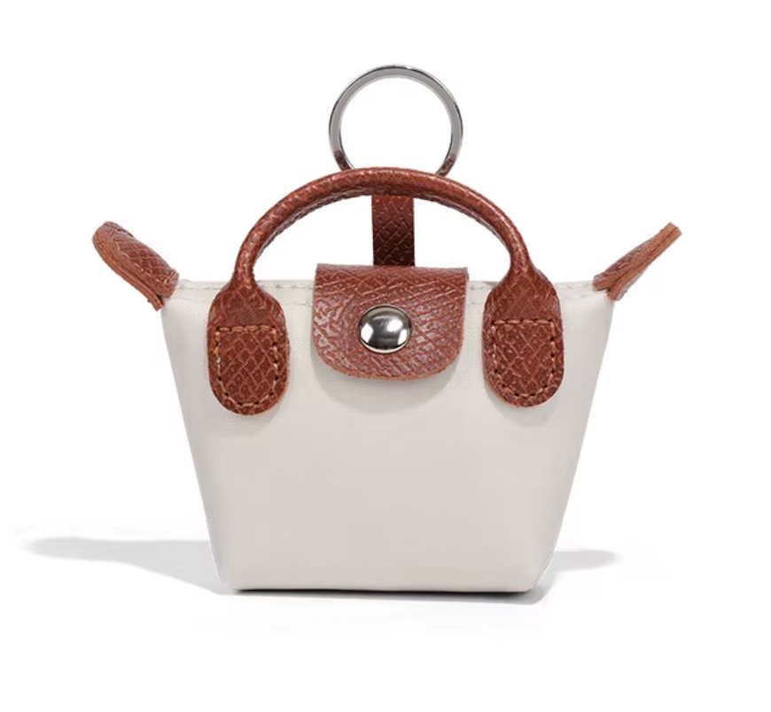 Borsa Longchamp Mini 3 in 1: portachiavi, custodia per AirPods e ciondolo a forma di labbra