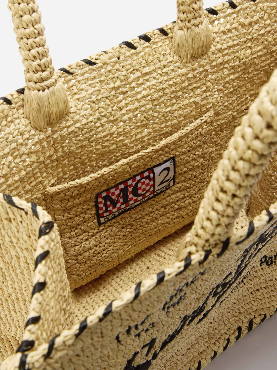 Beige Raffia Colette Bag with Black Embroidered Logo and Tassel