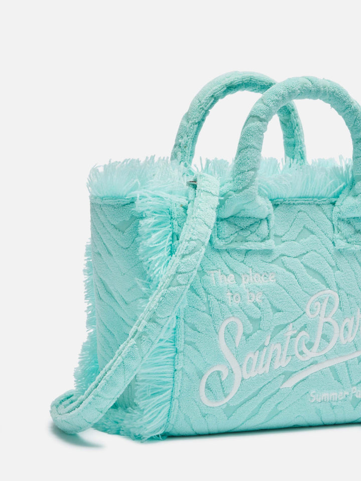 Mini Vanity Sponge Bag con stampa zebrata verde acqua in rilievo" can be rewritten as:

"Mini Vanity Bag in Spugna con Stampa Zebrata Verde Acqua in Rilievo