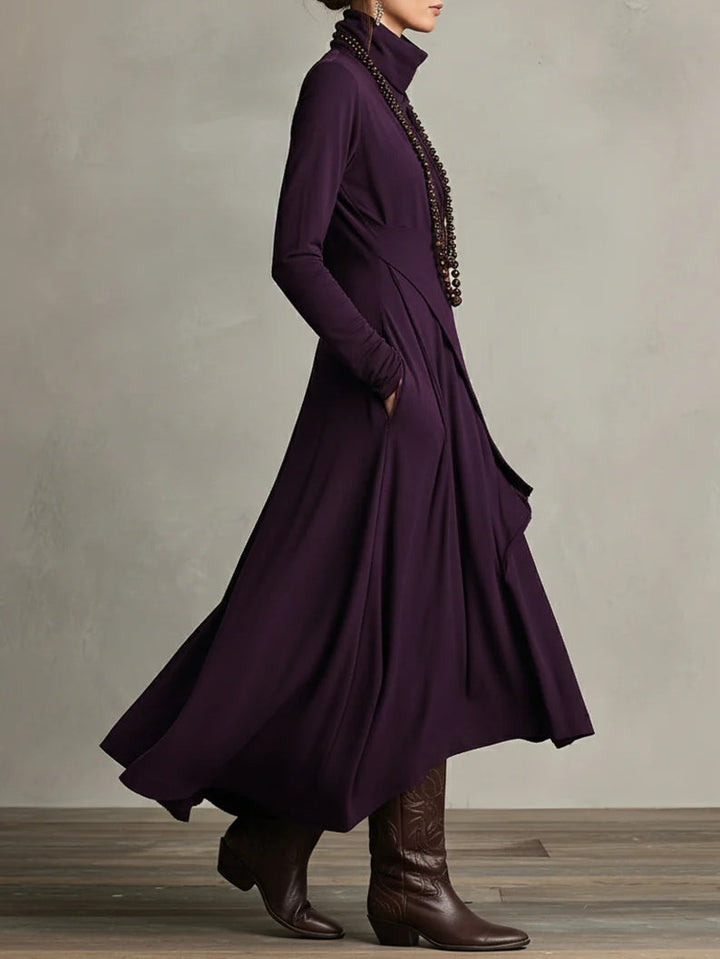 Aurelia · Vestito maxi plissettato asimmetrico con colletto alto