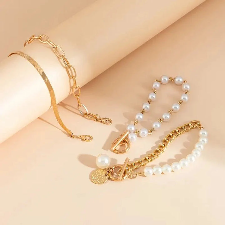 Set di 4 Bracciali Eleganti in Oro - Design a Serpente con Perle e Maglie