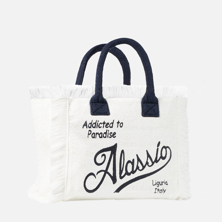 "Borsa a Spalla Vanity in Spugna con Ricamo Alassio" can be rewritten as: "Borsa Vanity in Spugna con Ricamo Alassio per Spalla".