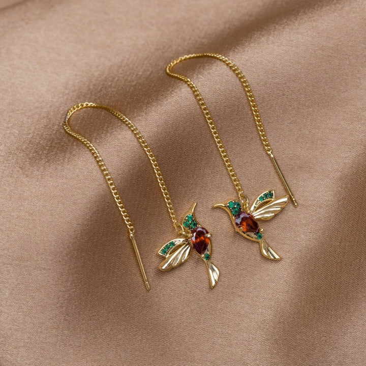Anelli in oro con un delicato pendente