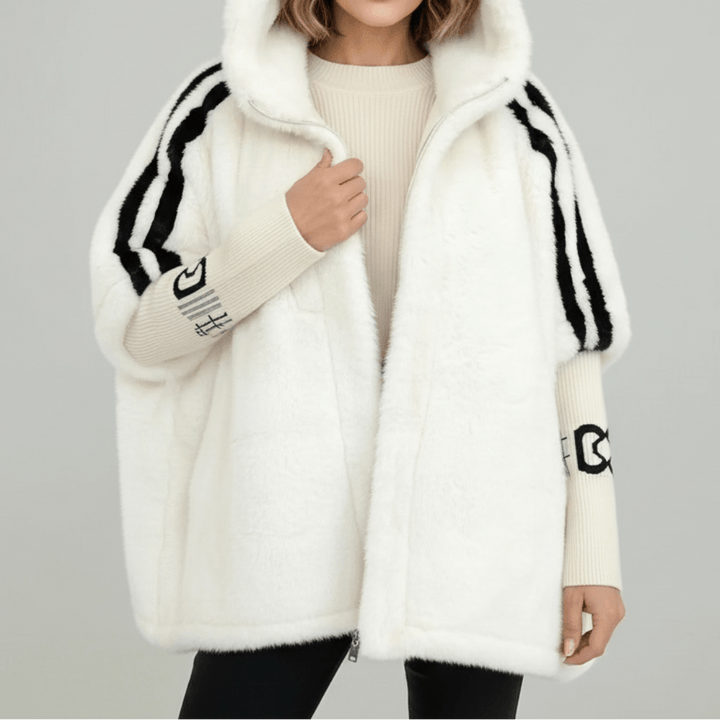"DONNA | Giacca con Cappuccio" can be rewritten as "DONA | Giacca con Cappuccio Elegante".