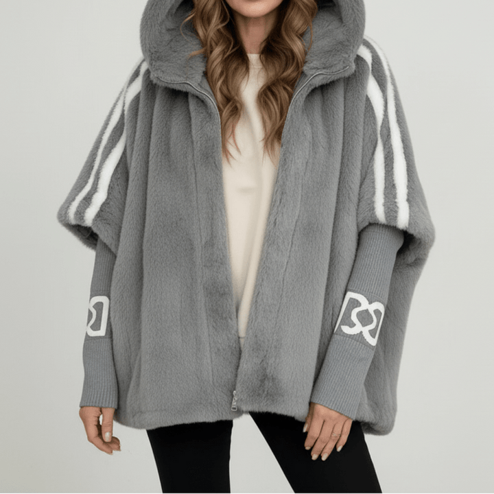 "DONNA | Giacca con Cappuccio" can be rewritten as "DONA | Giacca con Cappuccio Elegante".