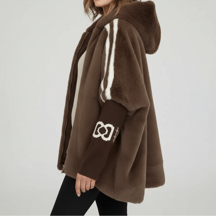 "DONNA | Giacca con Cappuccio" can be rewritten as "DONA | Giacca con Cappuccio Elegante".