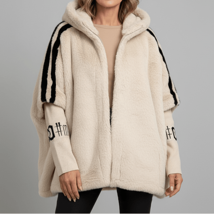 "DONNA | Giacca con Cappuccio" can be rewritten as "DONA | Giacca con Cappuccio Elegante".