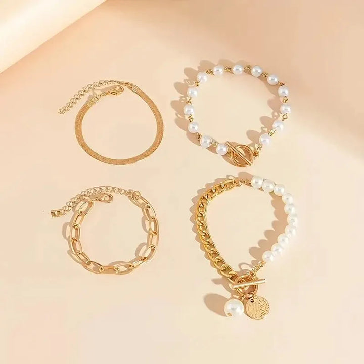 Set di 4 Bracciali Eleganti in Oro - Design a Serpente con Perle e Maglie