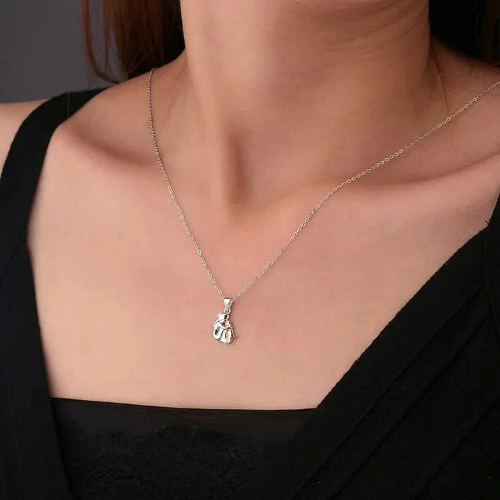 Collana ciondolo 'Abbraccio' con orecchini abbinati