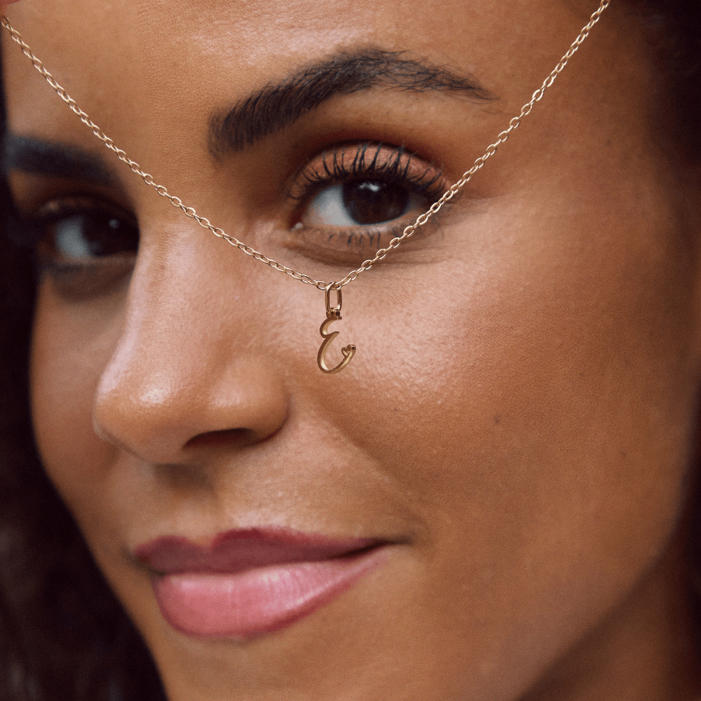 Collana a cuore con iniziali dorate