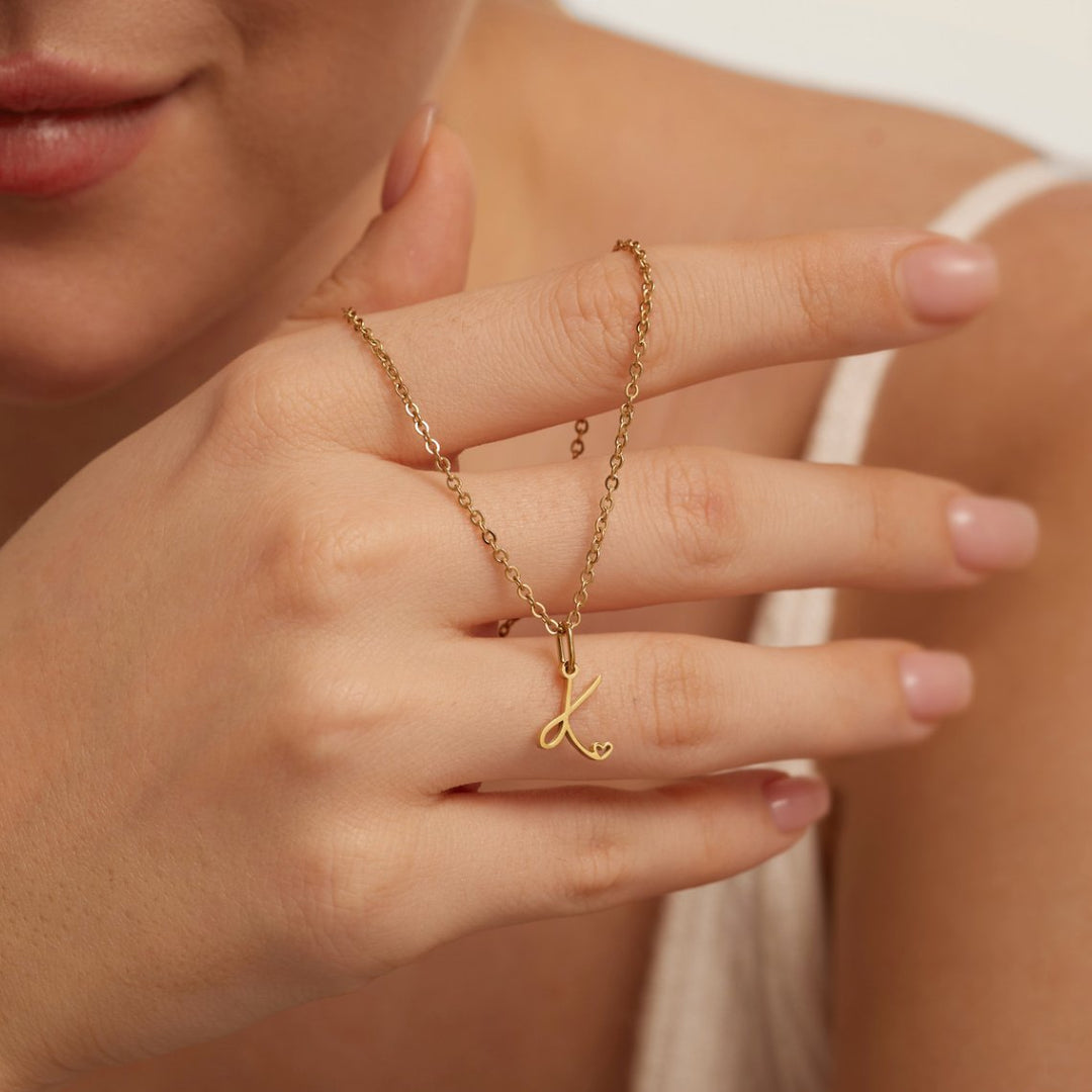 Collana a cuore con iniziali dorate