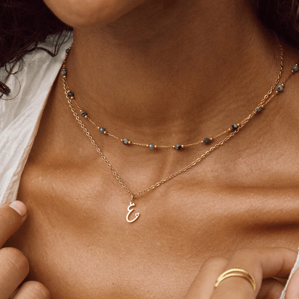 Collana a cuore con iniziali dorate