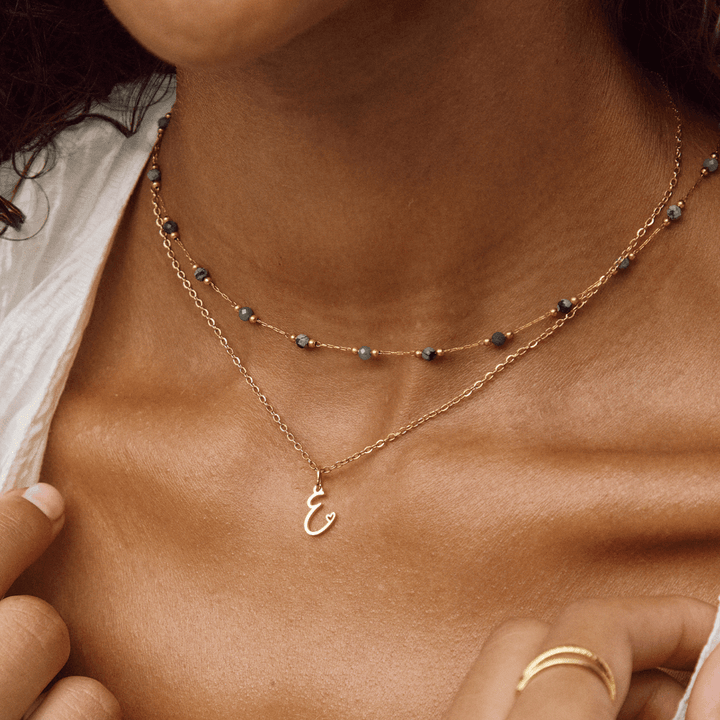Collana a cuore con iniziali dorate