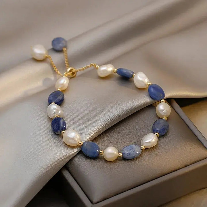 Elegante braccialetto con perle da riva