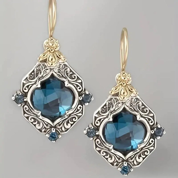 Orecchini in cristallo blu in oro e argento