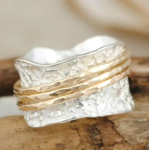Elegante anello vintage rotante in oro e argento